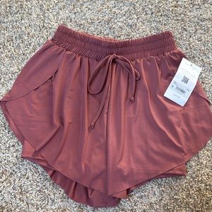Alter’d state flowy shorts. Size XSmall. New with tag. Pink/mauve.